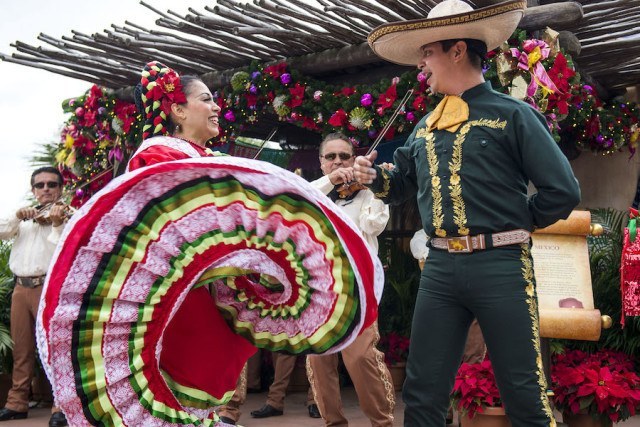 Featuring festive mariachi band music and dancing, the Mexico pavilion at Epcot brings the Fiesta de Navidad to life for the holidays.  Throughout the theme park's World Showcase, countries celebrate their own unique holiday traditions with storytellers and entertainment during Holidays Around the World. Epcot is located at Walt Disney World Resort in Lake Buena Vista, Fla. (Chloe Rice, photographer)