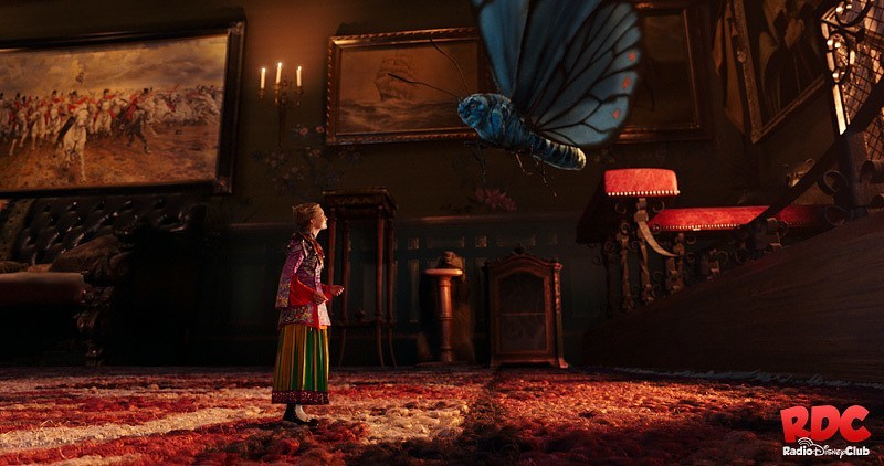 Alice (Mia Wasikowska) and Absolem (the voice of Alan Rickman) converse in Disney's ALICE THROUGH THE LOOKING GLASS, an all new adventure featuring the unforgettable characters from Lewis Carroll's beloved stories.