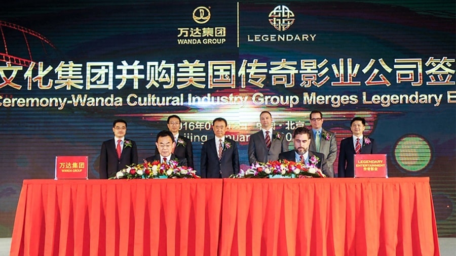 Mandatory Credit: Photo by Imaginechina/REX/Shutterstock (5536407b) Executives from Wanda Group, front left, and Legendary Entertainment sign agreements at a signing ceremony for Wanda Cultural Industry Group merging Legendary Entertainment Wanda Cultural Industry Group & Legendary Entertainment Merge Press Conference, Beijing, China - 12 Jan 2016