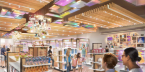 Dans un magasin de cosmétiques moderne et bien éclairé du Disney Village, avec des vitrines colorées et des poutres en bois au plafond, plusieurs clients parcourent divers produits de beauté.